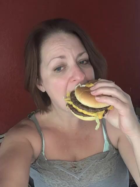 Relaxed Woman Eating Food