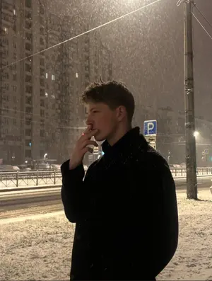 Photorealistic Night Portrait of Man Smoking in Snow - Nano Banana Pro AI Prompt