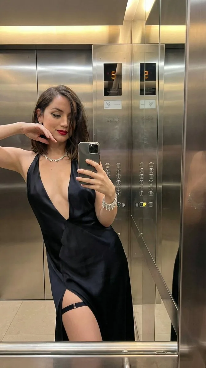 Luxury Elevator Mirror Selfie in Deep V-Neck Dress - Nano Banana Pro AI Prompt for Social Media Post reference