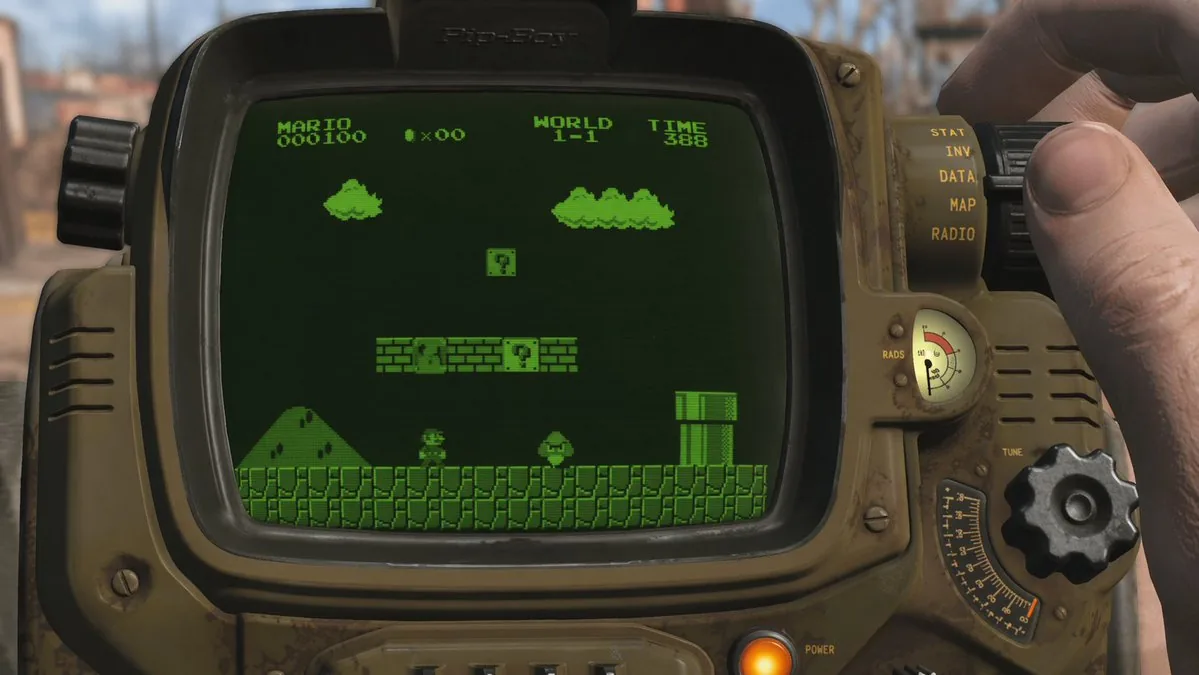 Retro Wrist Computer Playing Classic Platformer reference