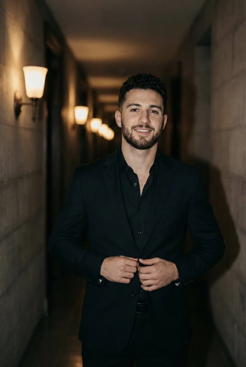 Cinematic Portrait of a Man in a Dimly Lit Hallway - Nano Banana Pro AI Prompt for Product Marketing reference