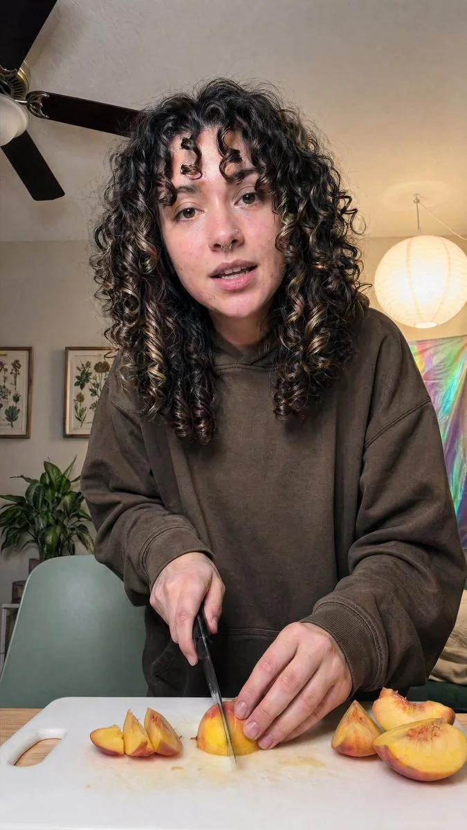 Cozy Indoor Peach Slicing Portrait reference