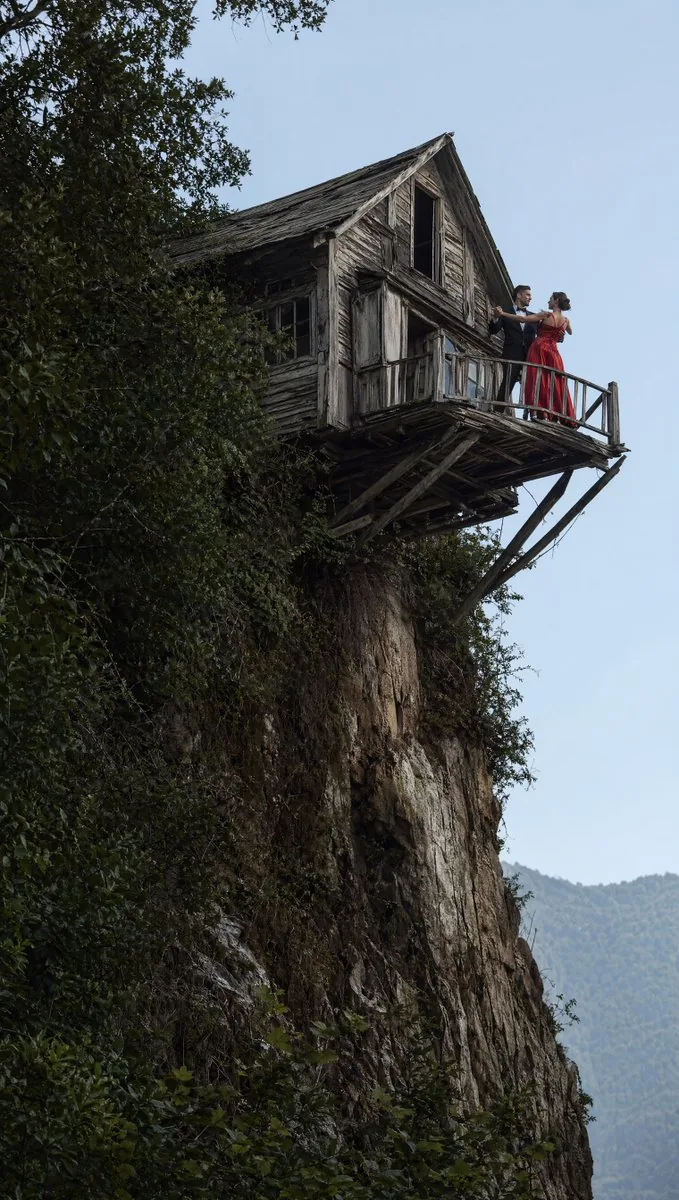 Dancing Couple on Cliffside House reference