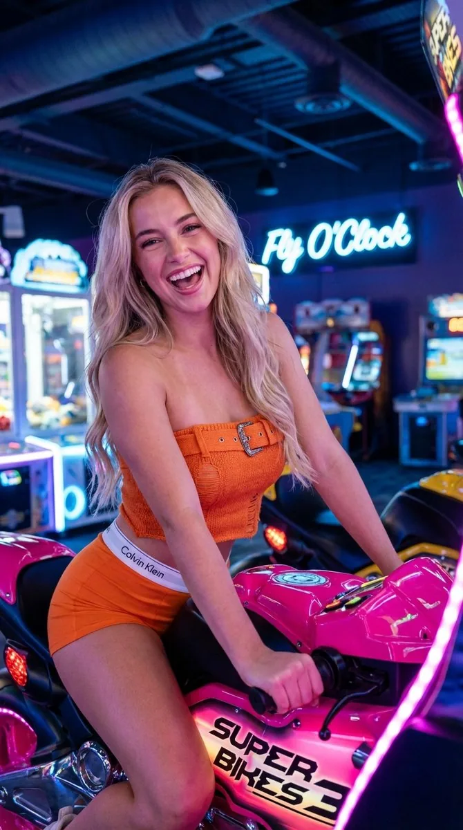Vibrant Arcade Portrait with Orange Outfit and Neon Lights - Nano Banana Pro AI Prompt for Social Media Post reference