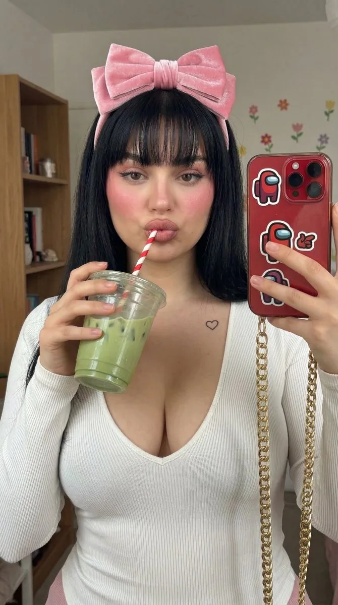 Blush-Heavy Matcha Selfie with Pink Bow Headband - Nano Banana Pro AI Prompt for Social Media Post reference