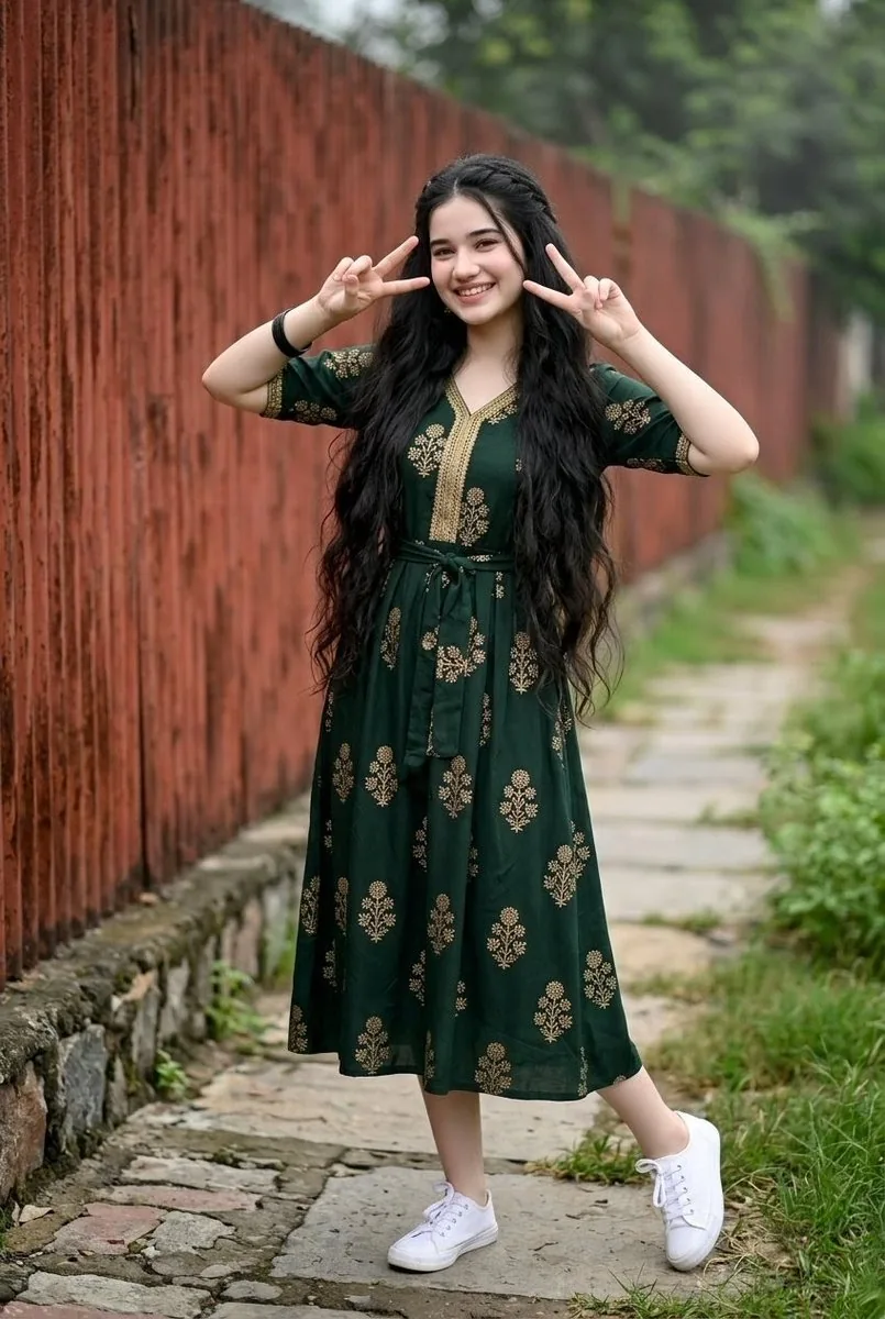 Young Indian Woman in Green Midi Dress reference