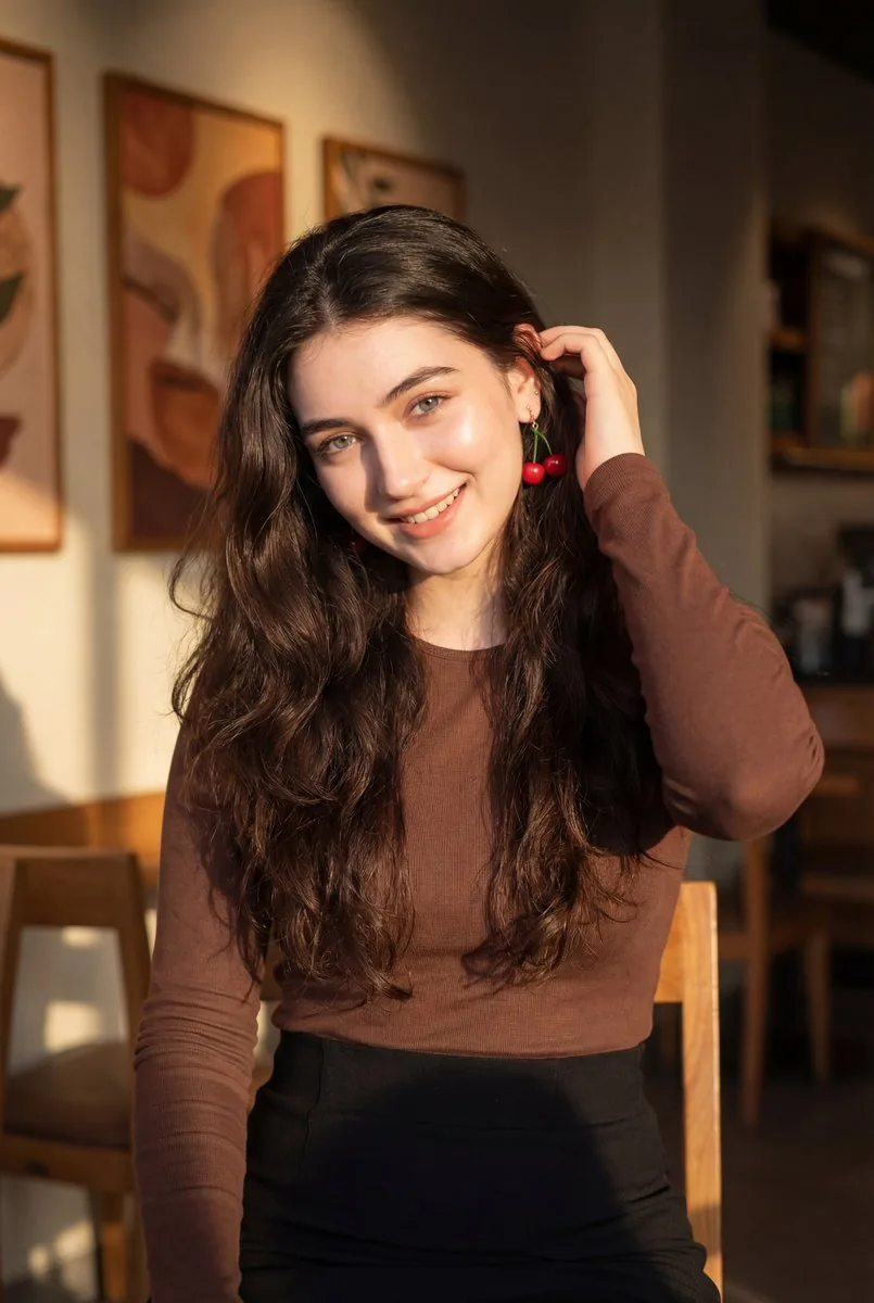 Golden Hour Portrait of a Smiling Young Woman reference