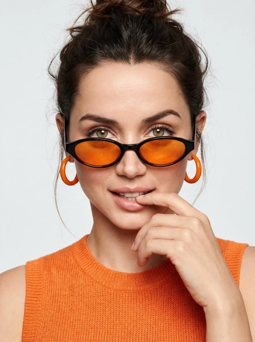 High-fashion editorial portrait with vivid orange accents - Nano Banana Pro AI Prompt for Social Media Post reference