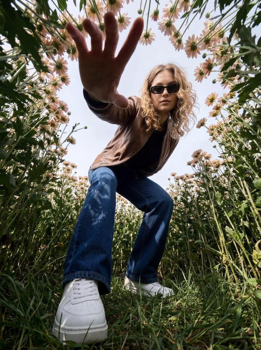 Ultra-Realistic Fashion Portrait with Aggressive Perspective - Nano Banana Pro AI Prompt for Product Marketing reference