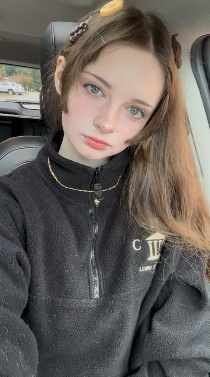 Close-up Candid Selfie Portrait of Young Woman reference